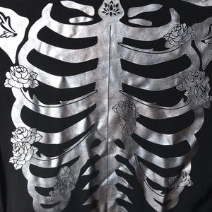 Spirit Halloween skeleton one-piece costume